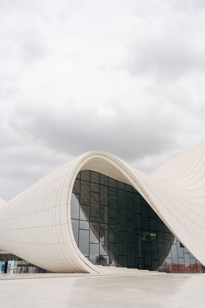 services-04 Elegant modern architecture of Heydar Aliyev Center in Baku, Azerbaijan.