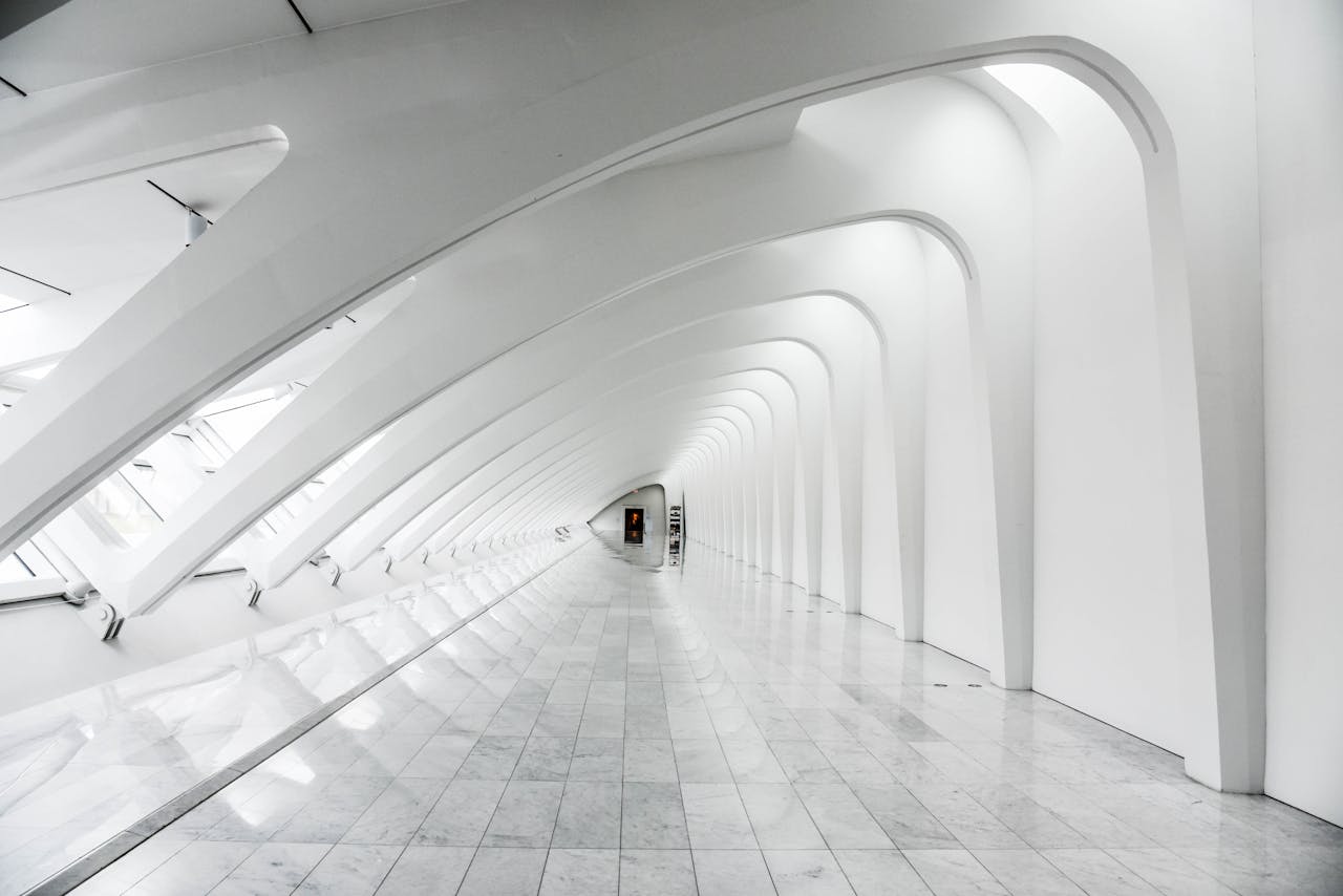 ours-journey Explore the sweeping modern arches and minimalistic design of the Milwaukee Art Museum's white hallway.